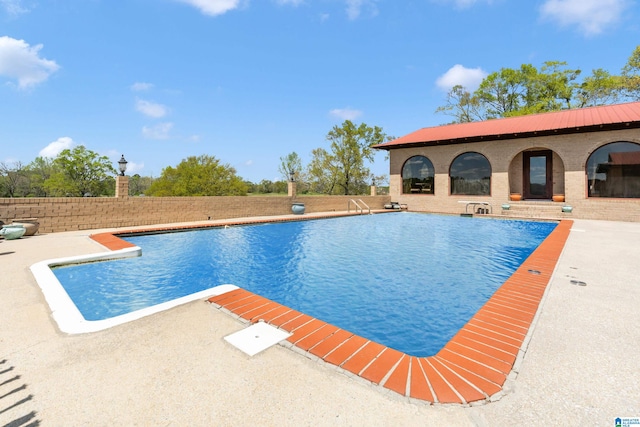view of pool with a patio