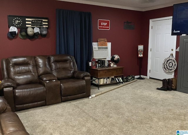 carpeted home theater featuring crown molding