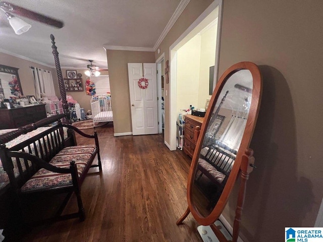 interior space with ceiling fan, ornamental molding, and dark hardwood / wood-style floors