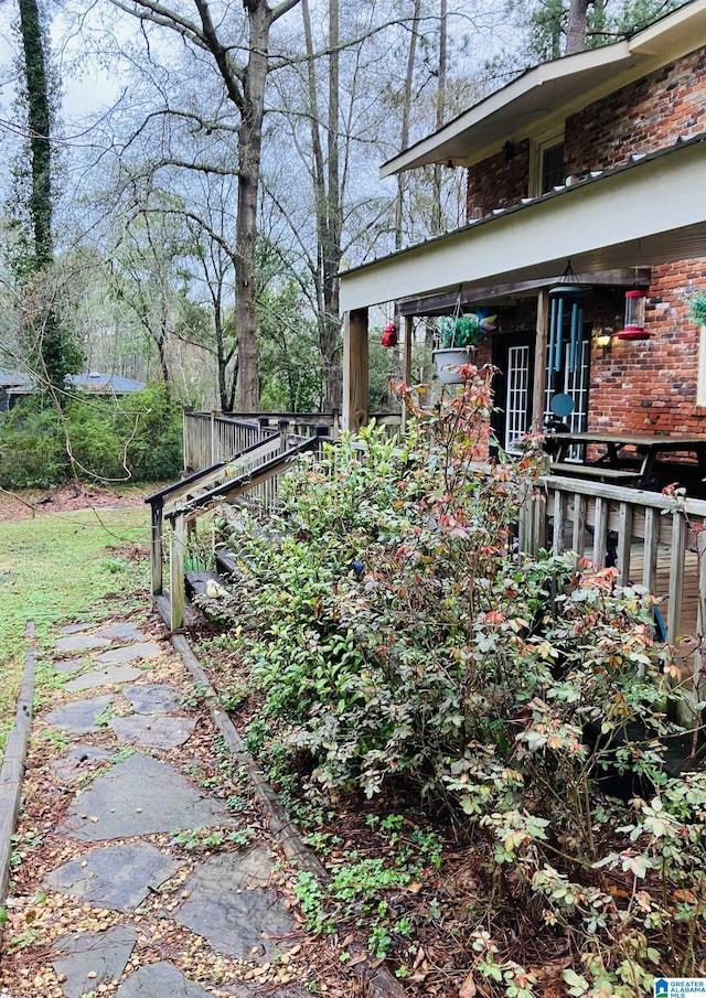 view of yard featuring a deck