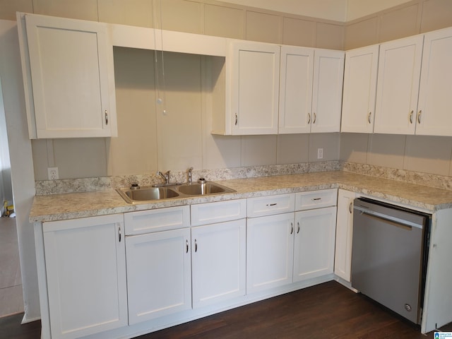 kitchen with sink, dishwasher, white cabinets, and dark hardwood / wood-style flooring