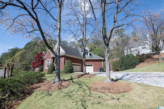 view of property exterior with a yard and a garage