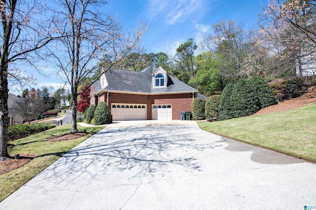 view of side of property with a lawn