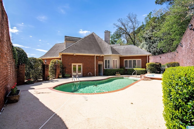 view of pool with a patio