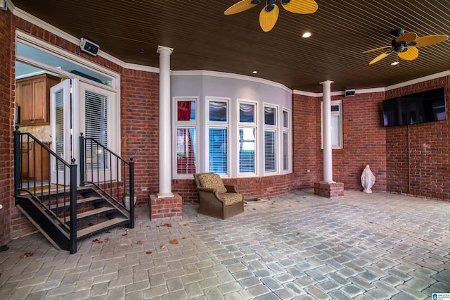 view of patio / terrace featuring ceiling fan