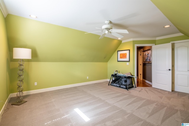 bonus room with light colored carpet, vaulted ceiling, and ceiling fan