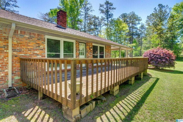 deck featuring a yard