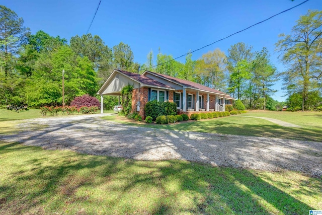 single story home with a front yard