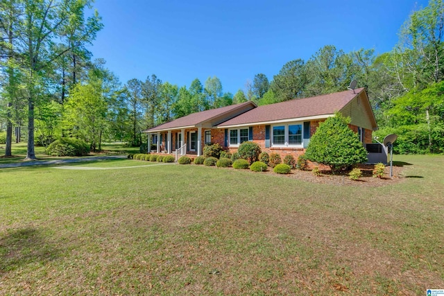 ranch-style home with a front lawn