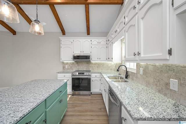 kitchen with stainless steel appliances, sink, tasteful backsplash, light hardwood / wood-style flooring, and white cabinets