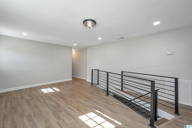 unfurnished room featuring light hardwood / wood-style flooring