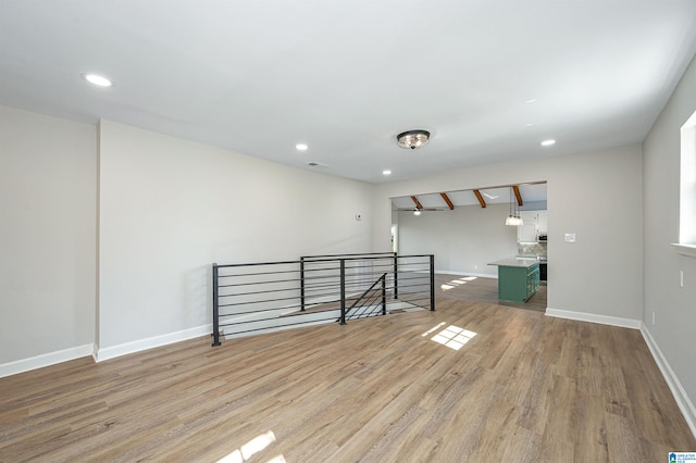 spare room featuring light wood-type flooring