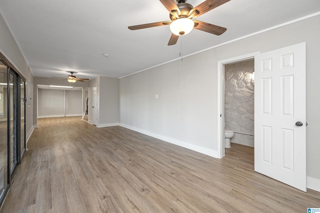 unfurnished living room with light wood-type flooring and ceiling fan