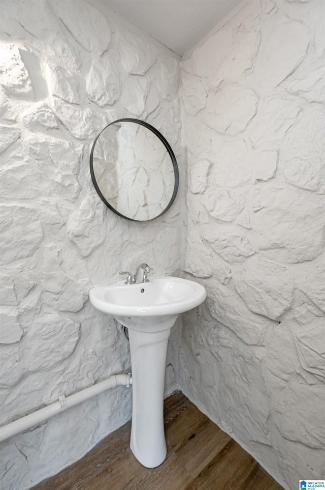 bathroom featuring wood-type flooring