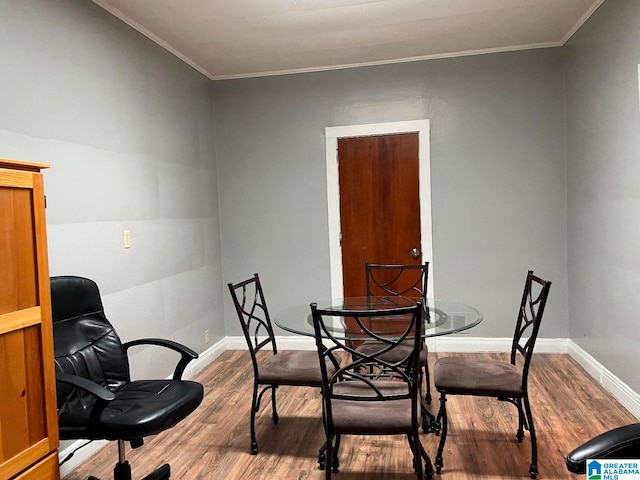 interior space with ornamental molding and light wood-type flooring