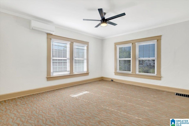 carpeted spare room with ceiling fan, ornamental molding, and a wall unit AC