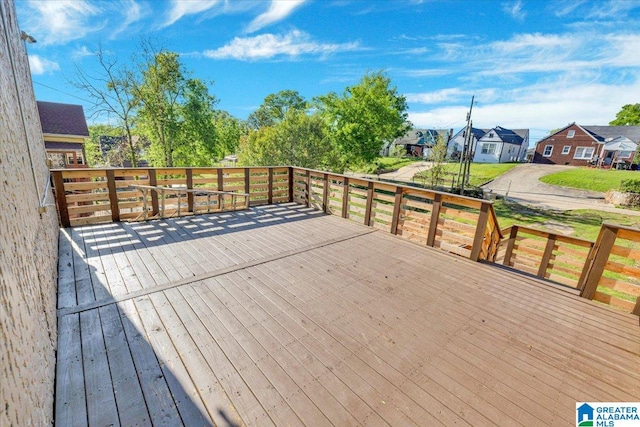 deck featuring a lawn