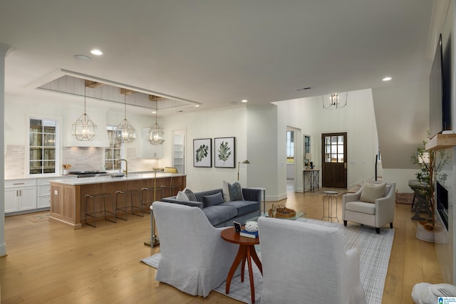 living room with light hardwood / wood-style floors