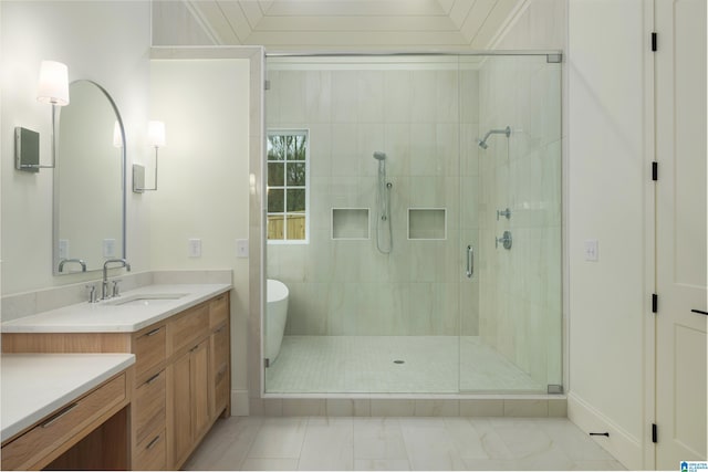 bathroom with vanity and a shower with door