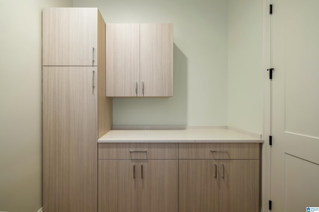 kitchen with light brown cabinetry