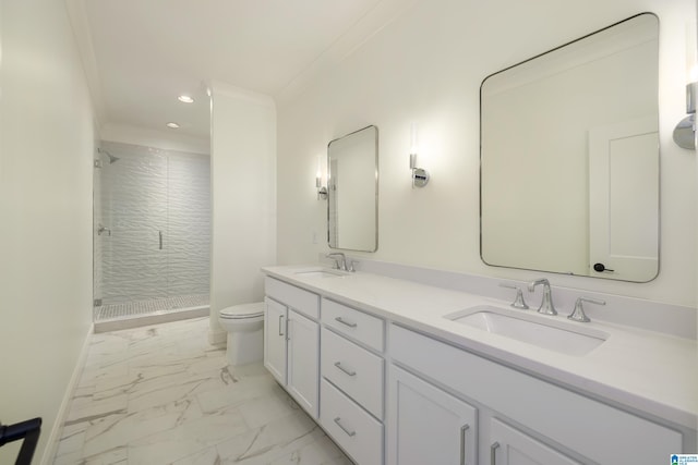 bathroom with vanity, toilet, ornamental molding, and a tile shower