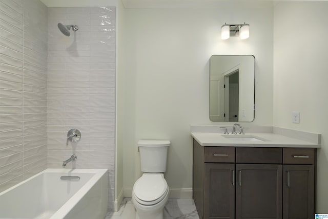 full bathroom featuring tiled shower / bath combo, toilet, and vanity