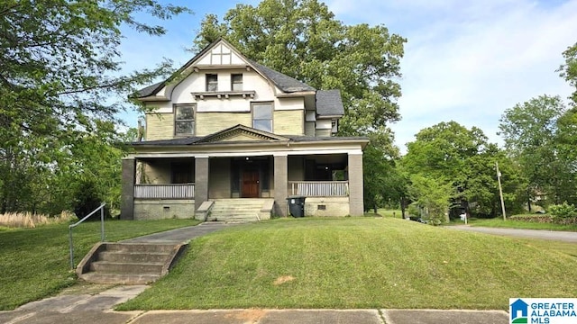 view of front of house featuring a front yard and a porch