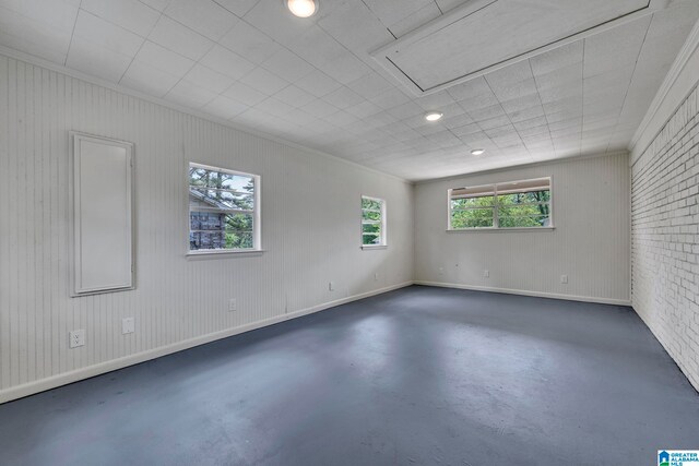 spare room featuring ornamental molding