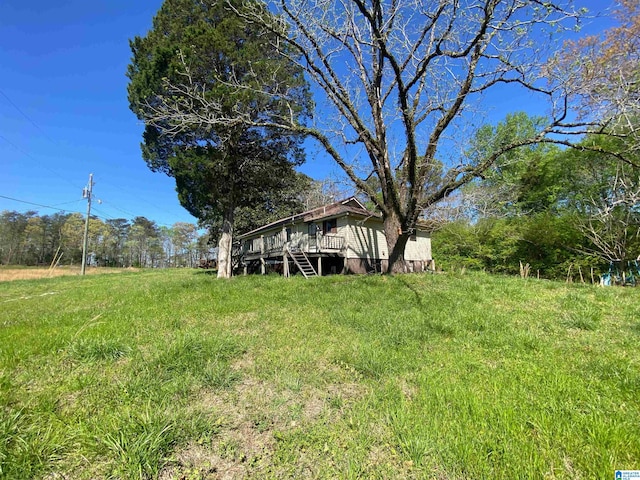 view of yard featuring a deck