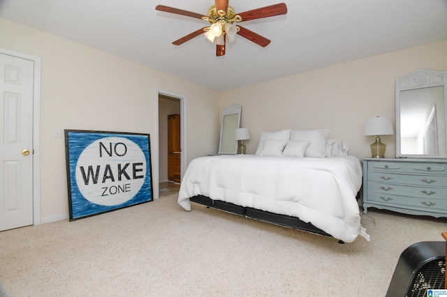 bedroom featuring ceiling fan and carpet floors