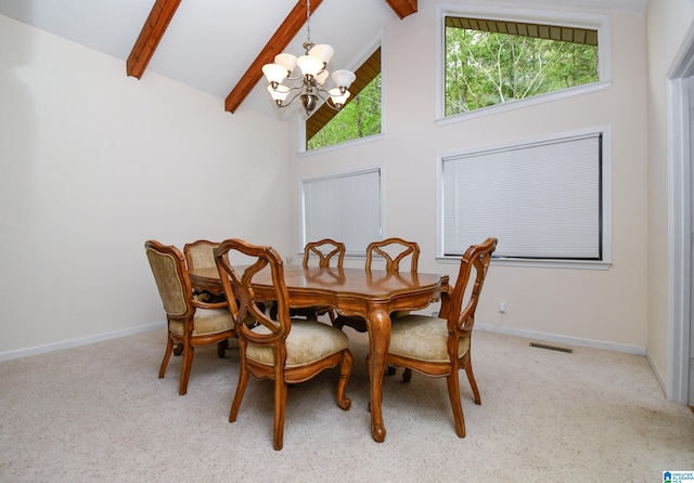 carpeted dining room featuring high vaulted ceiling, beam ceiling, and an inviting chandelier