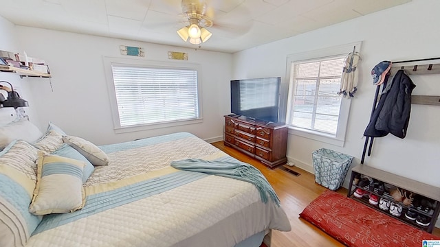 bedroom featuring ceiling fan and light hardwood / wood-style floors