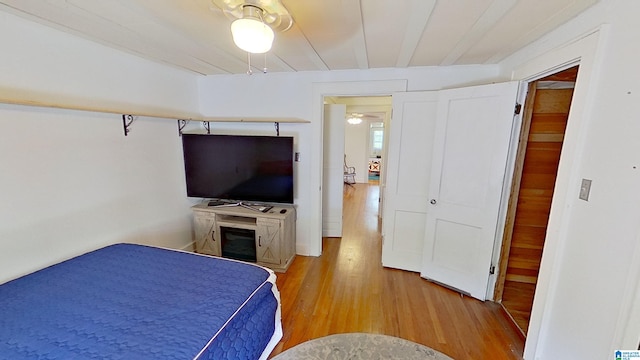 bedroom featuring ceiling fan and light wood-type flooring