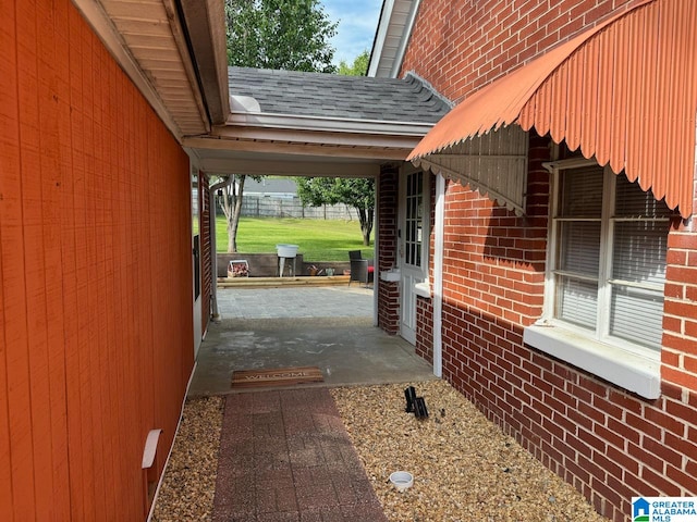 view of property exterior featuring a patio area