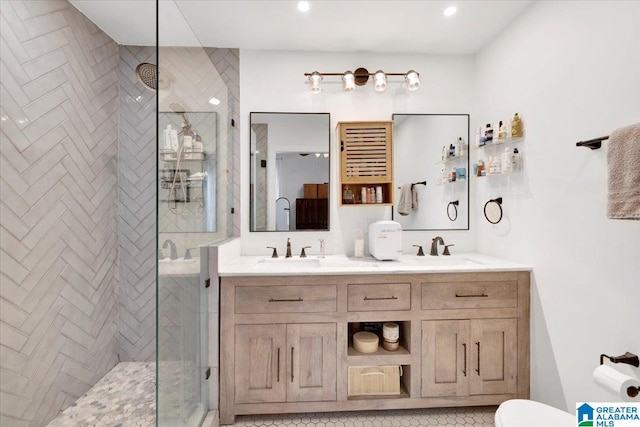 bathroom with vanity and an enclosed shower