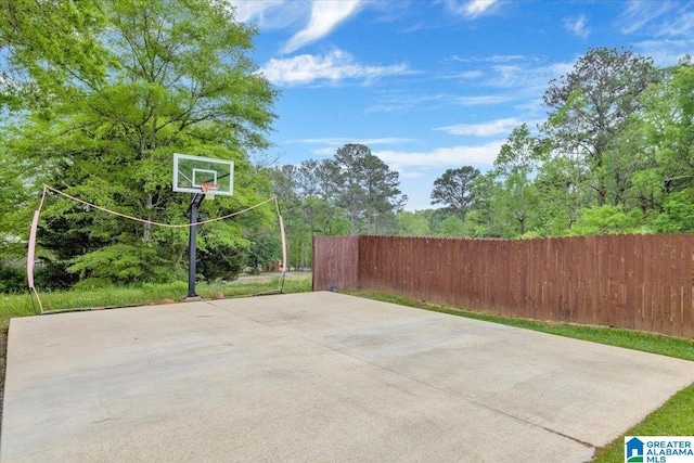 view of patio / terrace with basketball hoop