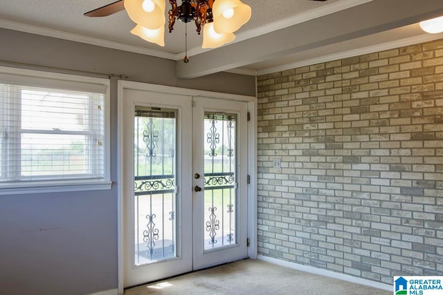 doorway to outside featuring french doors, light carpet, ceiling fan, and a textured ceiling