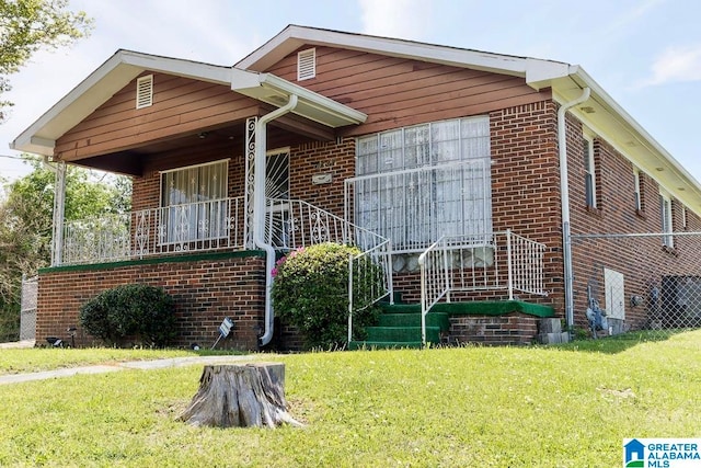 view of property exterior featuring a lawn