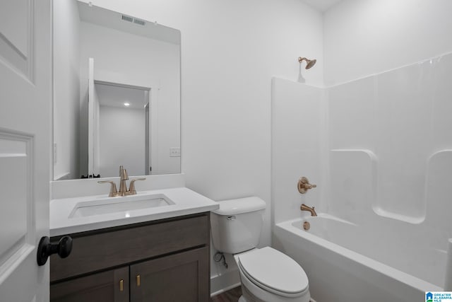 full bathroom with oversized vanity, toilet, and bathtub / shower combination