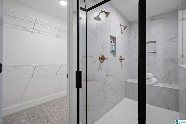 bathroom with a shower with shower door