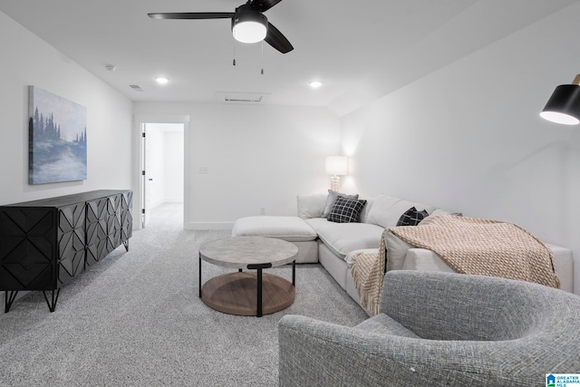 living room featuring ceiling fan and light carpet