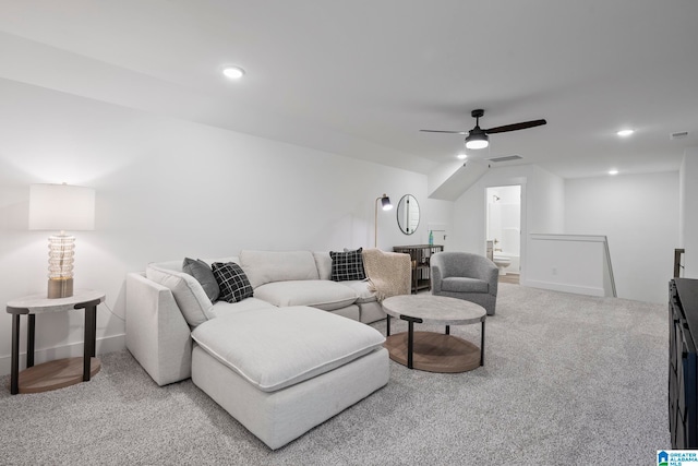 living room with light carpet and ceiling fan