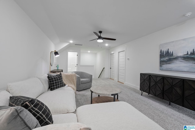 carpeted living room featuring ceiling fan