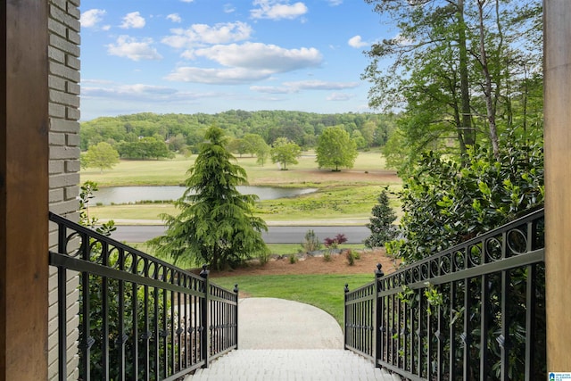 balcony featuring a water view