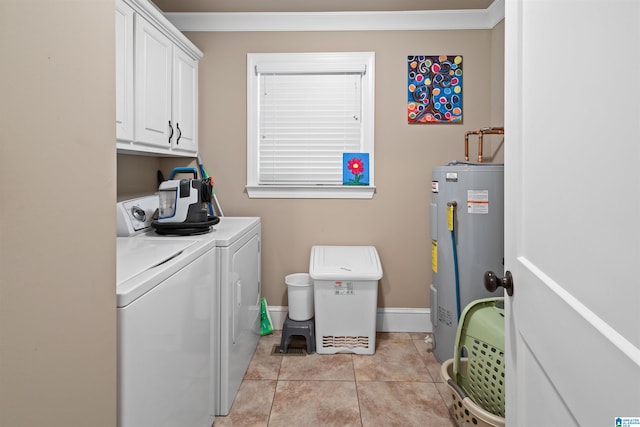 laundry area featuring cabinets, separate washer and dryer, crown molding, electric water heater, and light tile floors