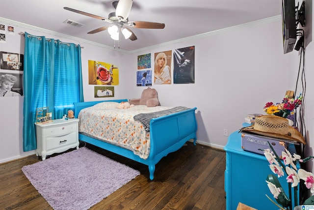 bedroom with ornamental molding, dark hardwood / wood-style flooring, and ceiling fan