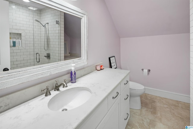 bathroom with an enclosed shower, tile floors, vanity, toilet, and lofted ceiling