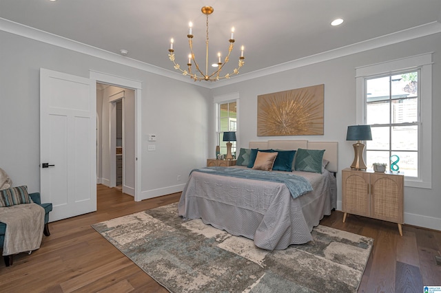 bedroom featuring ornamental molding, wood-type flooring, and multiple windows