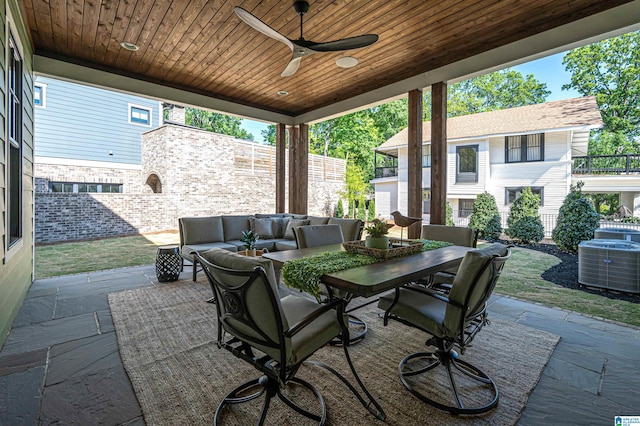 view of patio with an outdoor living space, central AC, and ceiling fan