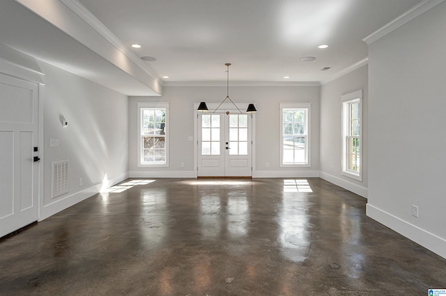 interior space with french doors, ornamental molding, and plenty of natural light